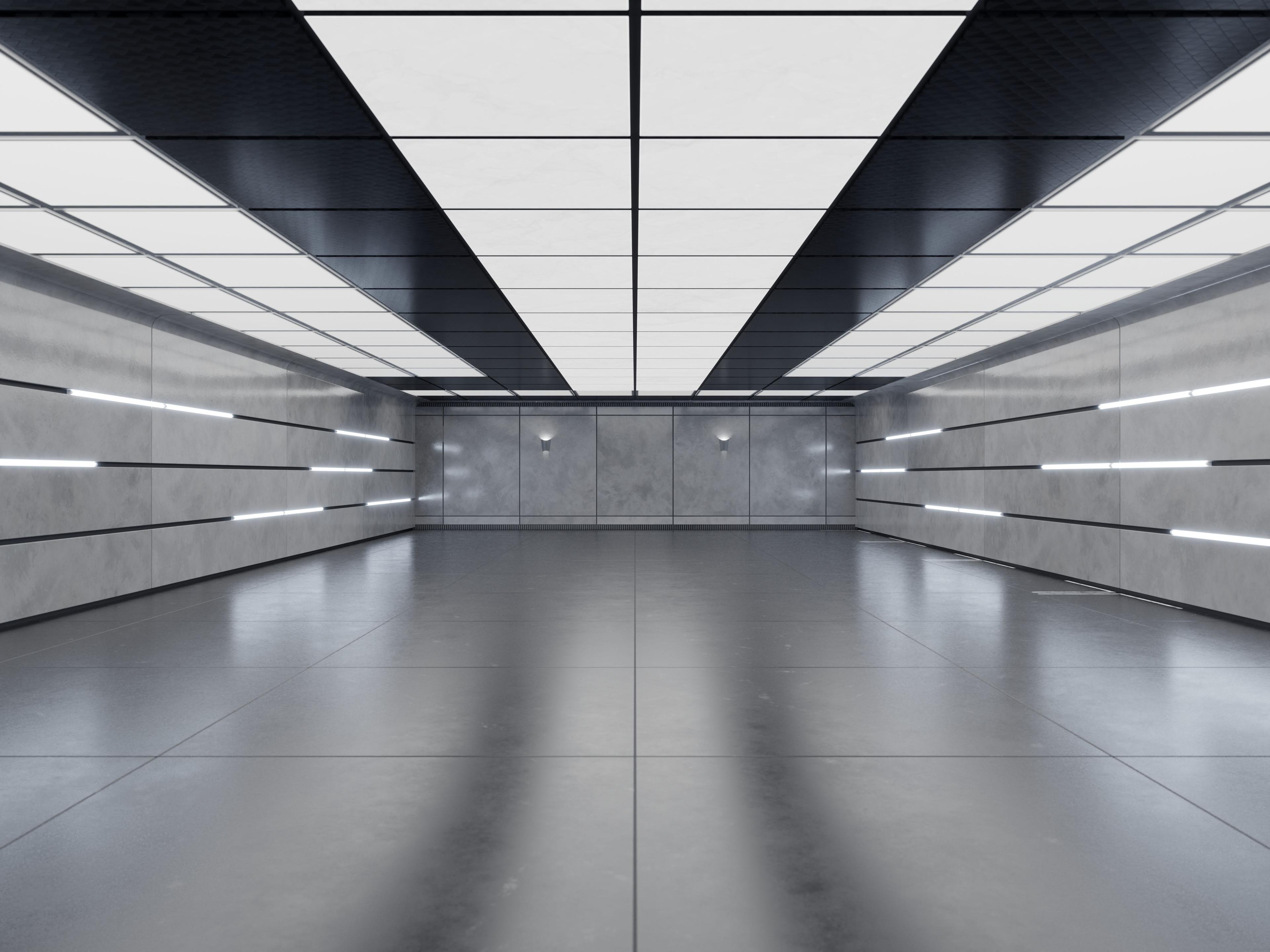 Modern warehouse interior with gray walls, white ceiling and LED lighting. Empty high-standard warehouse space.